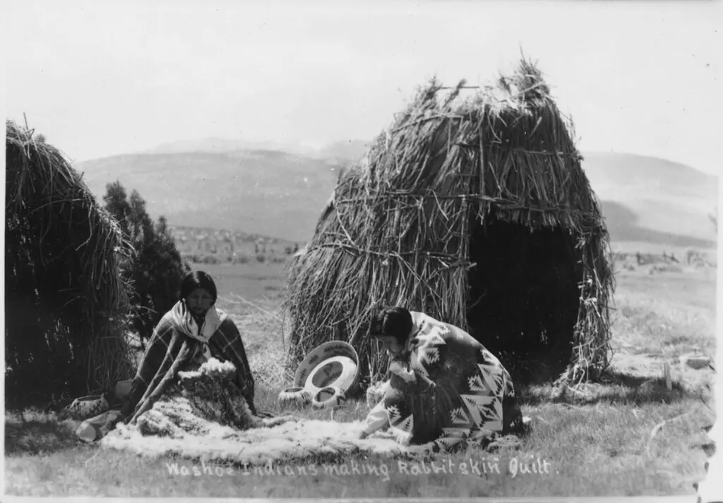 Washoe Indians making a rabbit skin quilt.