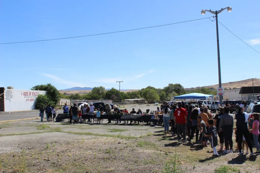 The line at the Sun Valley Back to School Supplies Giveaway.