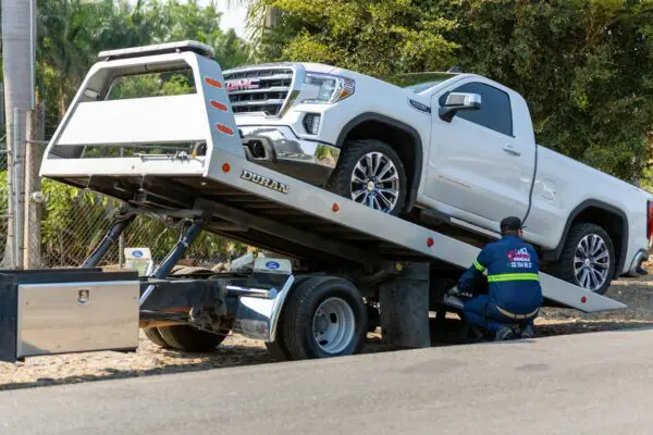 KUNR Vehicle Donation Program Photo by Jonathan Reynaga: https://www.pexels.com/photo/a-car-on-a-tow-truck-17429097/
