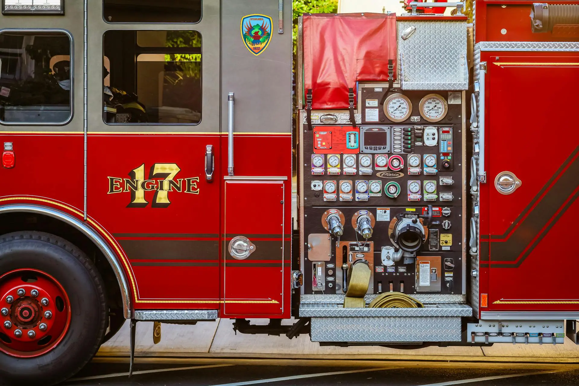 Photo by Robert So: https://www.pexels.com/photo/side-view-of-red-fire-truck-12274186/