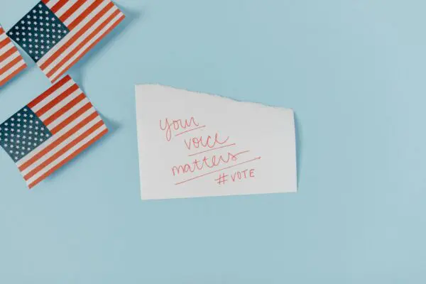 Photo by Tara Winstead: https://www.pexels.com/photo/white-and-red-striped-paper-on-white-surface-8849334/