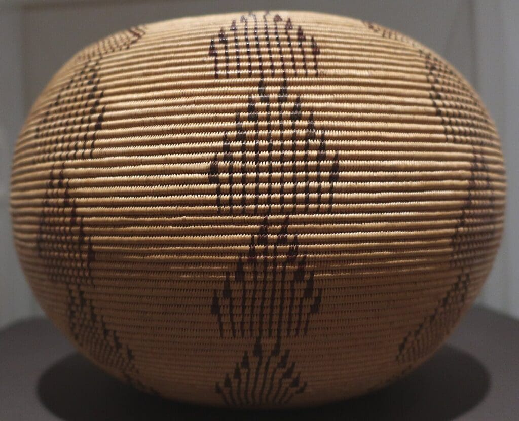 Washoe basketry vessel made by Dat So La Lee (Louisa Keyser), 1900, willow, braken fern, red bud, Brooklyn Museum. By Wmpearl - Own work, CC0, https://commons.wikimedia.org/w/index.php?curid=84369465.