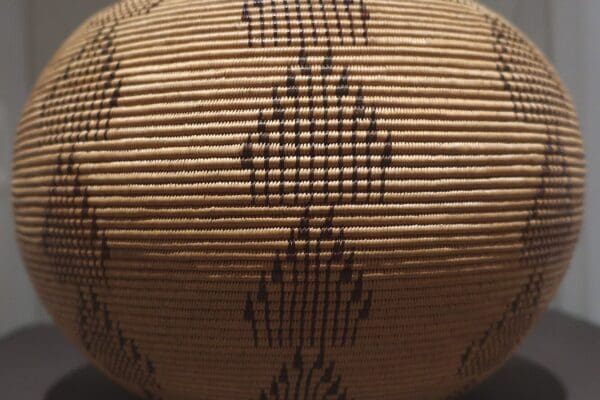 Washoe basketry vessel made by Dat So La Lee (Louisa Keyser), 1900, willow, braken fern, red bud, Brooklyn Museum. By Wmpearl, CC0, via Wikimedia Commons.