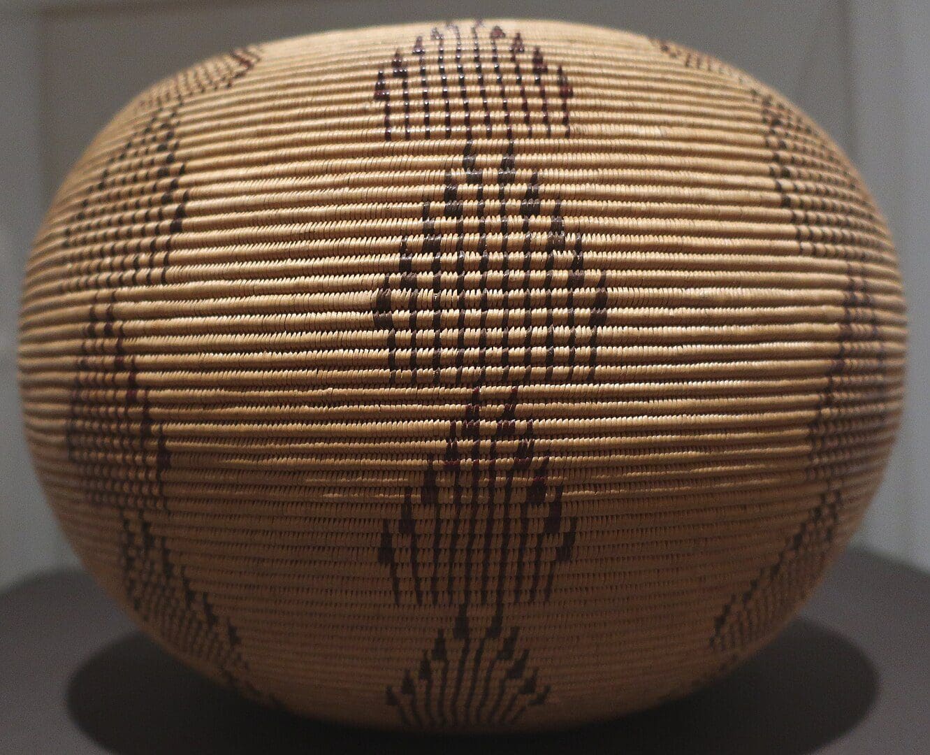 Washoe basketry vessel made by Dat So La Lee (Louisa Keyser), 1900, willow, braken fern, red bud, Brooklyn Museum. By Wmpearl, CC0, via Wikimedia Commons.
