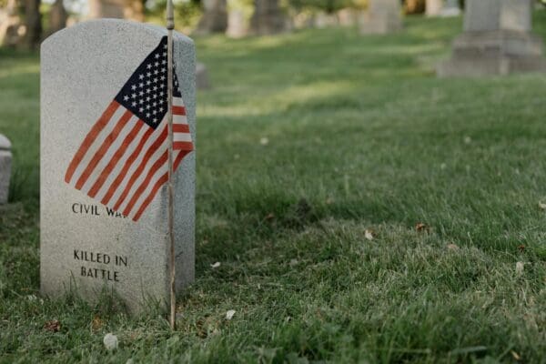 Photo by RDNE Stock project from Pexels: https://www.pexels.com/photo/veteran-s-tombstone-8865407/