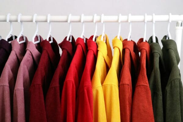 Colorful clothing hanging on a rack