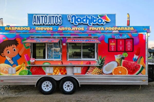 The cute design of Antojitos El Nachito is located on Sun Valley Blvd in the parking lot of the Super Carniceria.