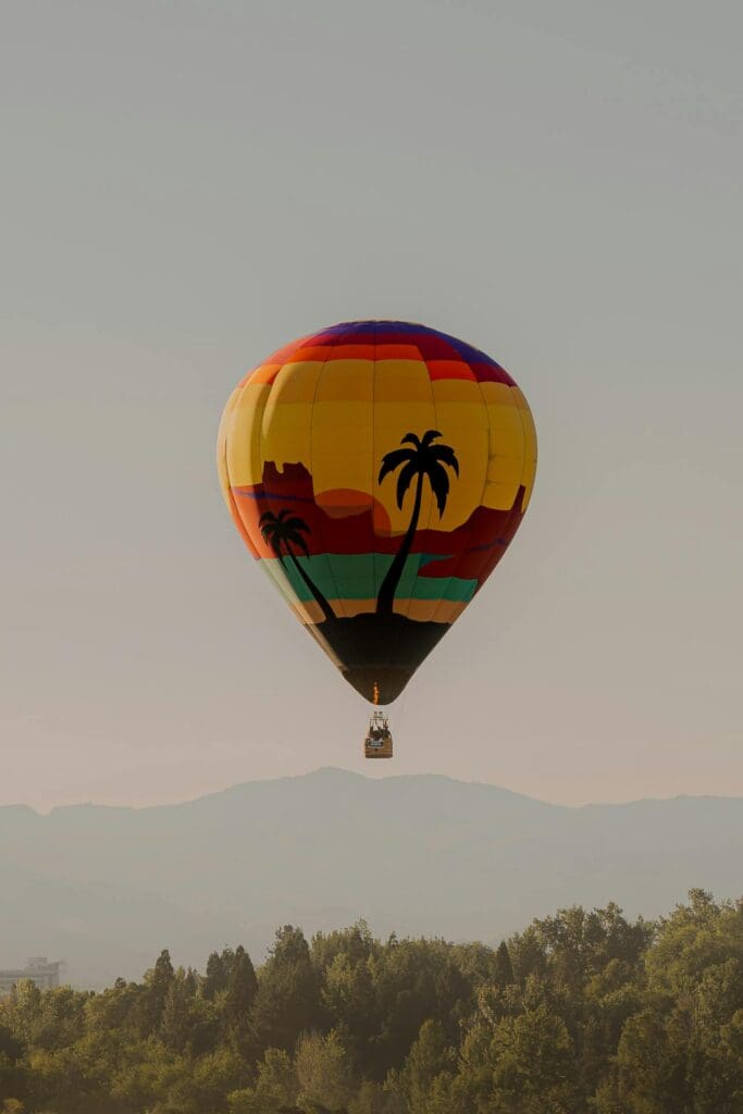 Photo by Michael Villanueva: https://www.pexels.com/photo/vibrant-hot-air-balloon-over-reno-skies-28436564/