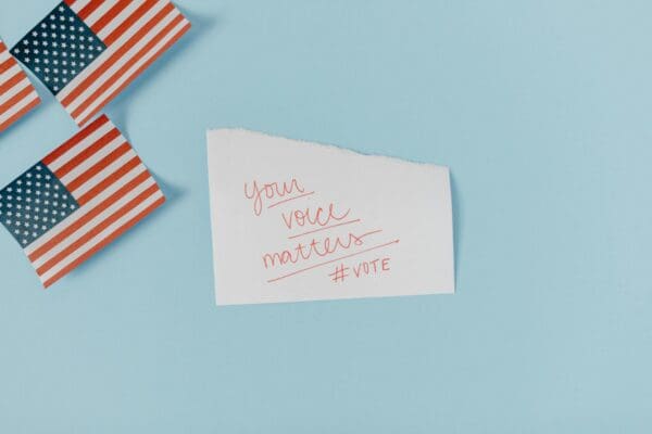 Photo by Tara Winstead: https://www.pexels.com/photo/white-and-red-striped-paper-on-white-surface-8849334/