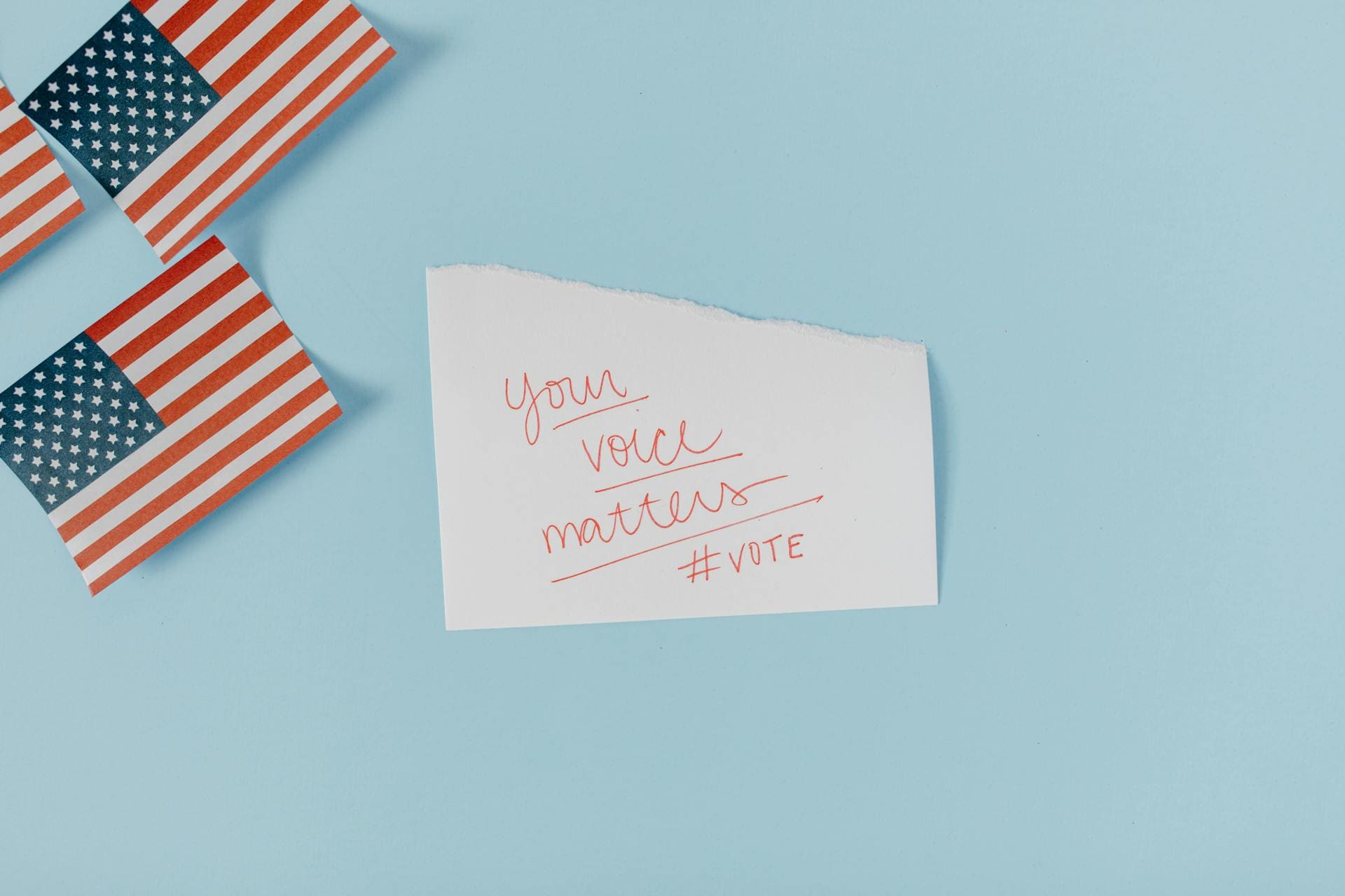 Photo by Tara Winstead: https://www.pexels.com/photo/white-and-red-striped-paper-on-white-surface-8849334/