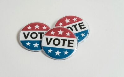 Image courtesy of Sora Shimazaki on Pexels. https://www.pexels.com/photo/us-voting-badges-on-white-surface-5926409/