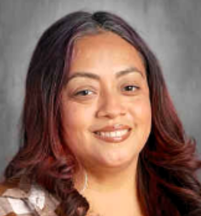 Esther Valdez is a caring individual and secretary at Hug High School.