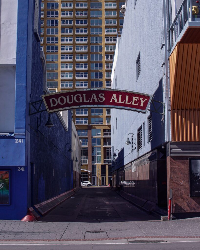 Photo by Jacob Garner from Pexels: https://www.pexels.com/photo/douglas-alley-downtown-reno-nevada-united-states-7122820/